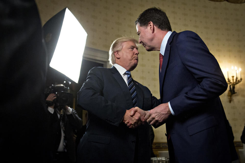 President Trump with James Comey, the former director of the FBI. (Photo: Andrew Harrer-Pool/Getty Images)