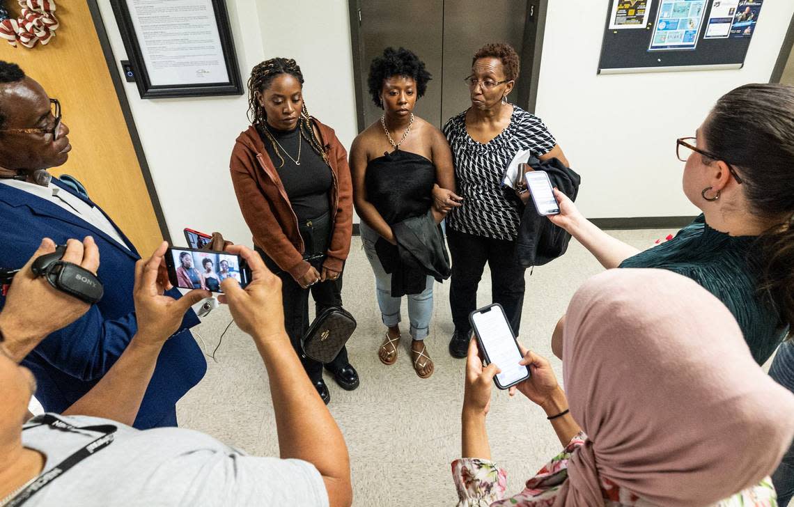Anthony Johnson Jr.’s sisters Janell and Chanell Johnson and his mother, Jacqualyne, speak with the media gathered to hear about their comments regarding Anthony’s death while incarcerated at the Tarrant County Commissioners Court meeting on Tuesday, May 7, 2024.