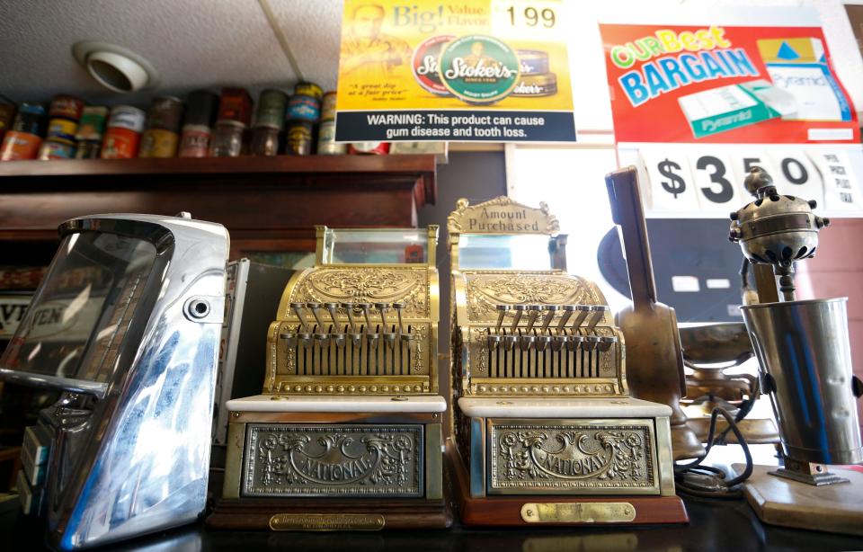 Antique cash registers at Don Johnson's Tobacco World on Glenstone Avenue, on Monday, Oct. 3, 2016. 