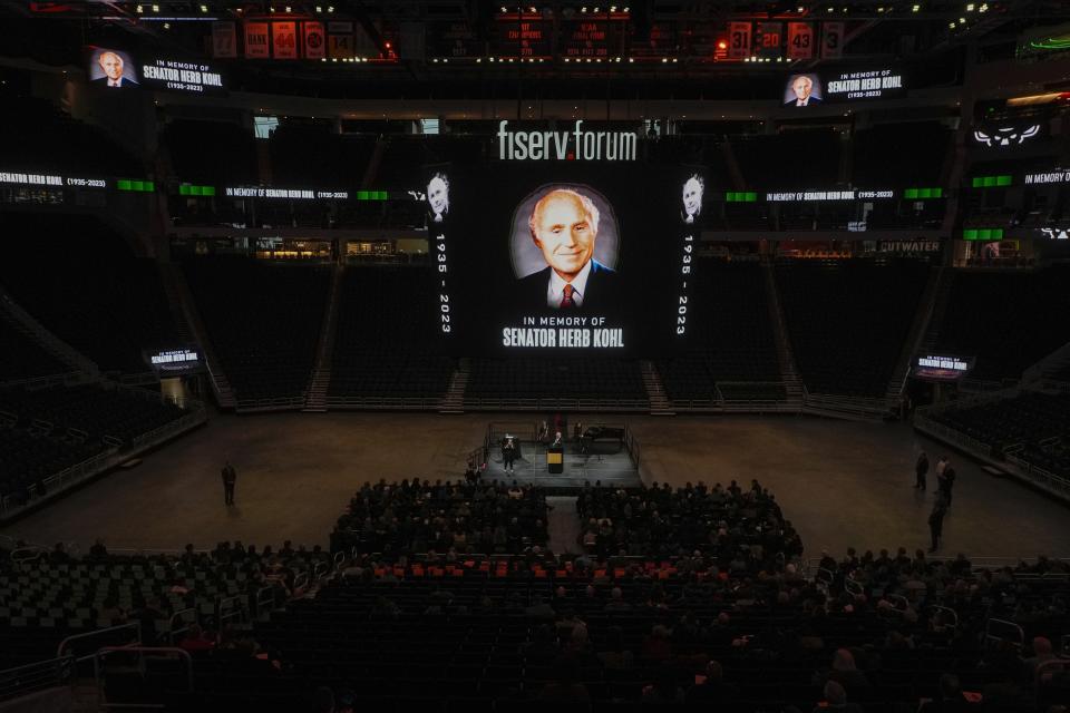 People attend a memorial service for former U.S. Sen. Herb Kohl, Friday, Jan. 12, 2024, at the Fiserv Forum in Milwaukee. (AP Photo/Morry Gash)