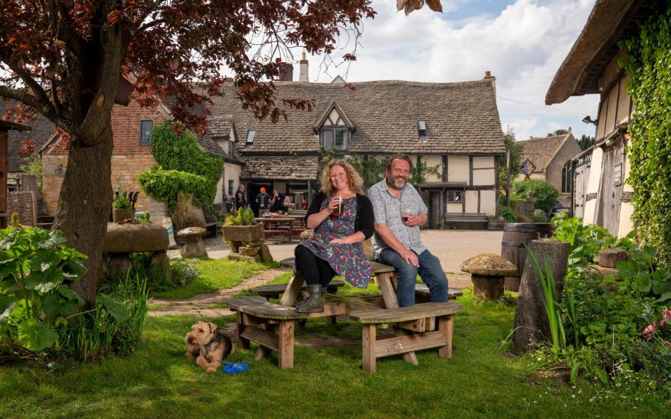 The pub and its landlord, with owner and dog -  Andrew Crowley