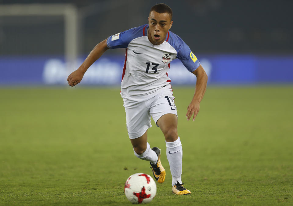 FILE - In this Monday, Oct. 16, 2017 file photo, Sergino Dest of the U.S controls the ball during the FIFA U-17 World Cup match against Paraguay in New Delhi, India. Ajax right back Sergino Dest has pledged his international future to the United States. The 18-year-old, who has a Surinamese-American father and Dutch mother, put an end Monday, Oct 28, 2019 to intense speculation about whether he would choose to play for the United States or the Netherlands, his country of birth. (AP Photo/Tsering Topgyal)