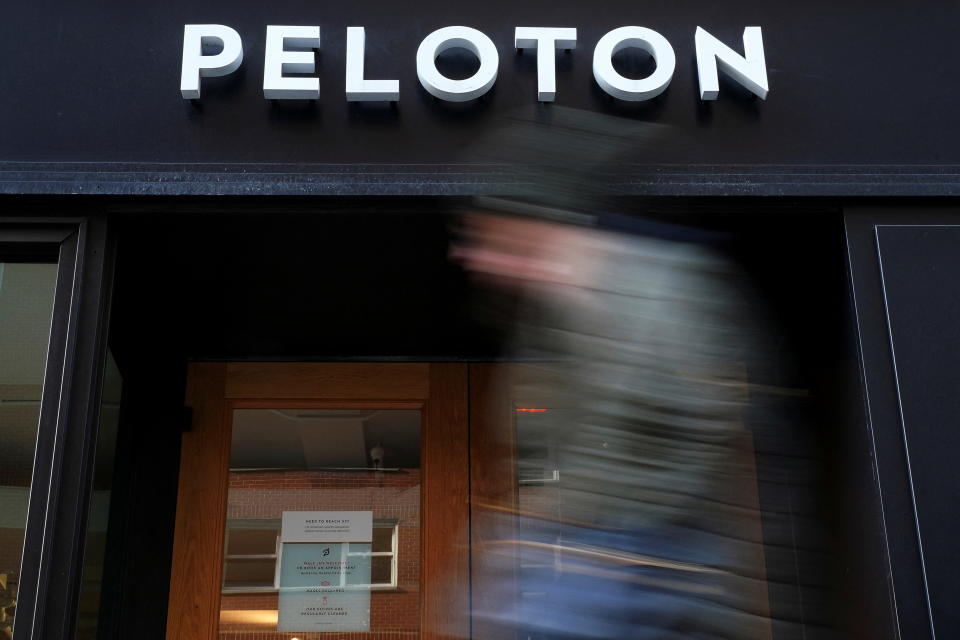 A person walks past a Peloton store in the Manhattan borough of New York City, U.S., January 25, 2022.  REUTERS/Carlo Allegri