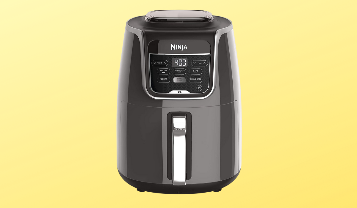 Black and silver air fryer with LCD screen on the front and Ninja logo