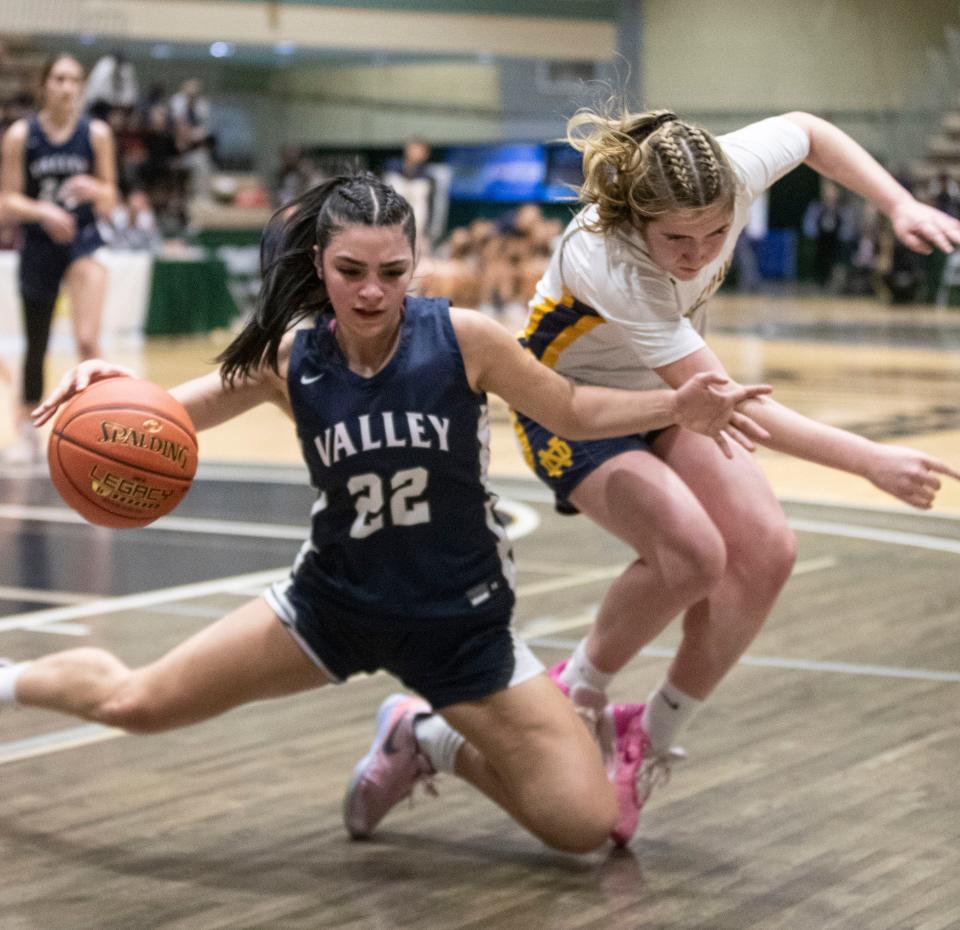 Brianna Foody of Putnam Valley battles Amalie Jadwick of Utica Notre Dame in a New York State girls Class B basketball semifinal at Hudson Valley Community College in Troy March 15, 2024. Notre Dame defeated Putnam Valley 57-47