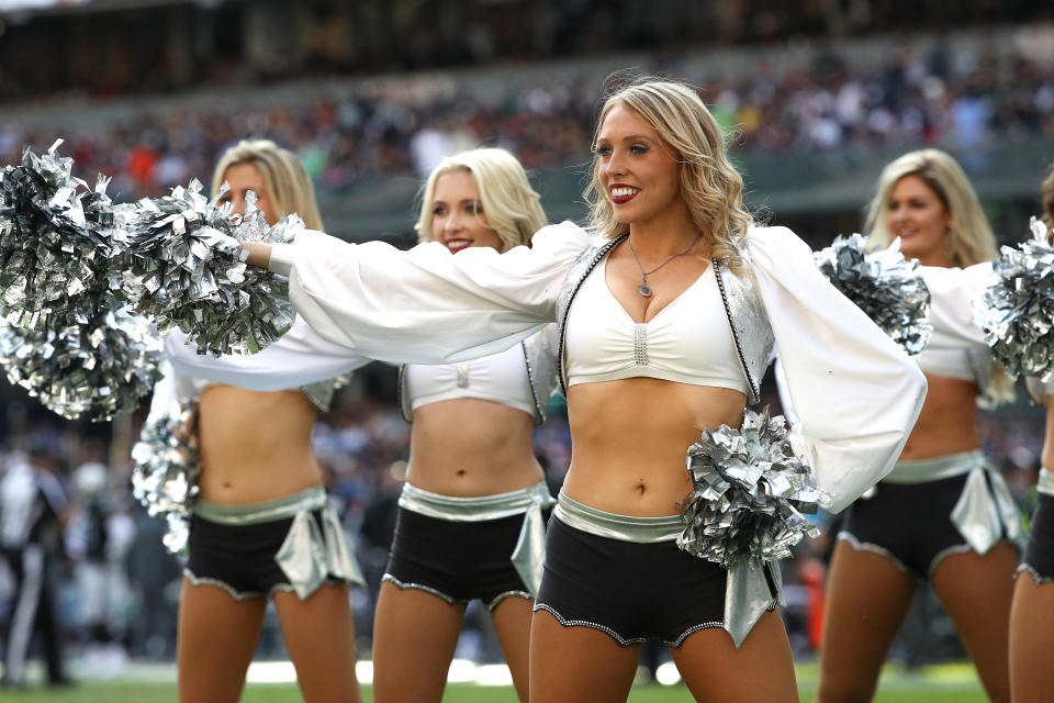<p>Oakland Raiders cheerleaders dance during the first half against the New England Patriots at Estadio Azteca on November 19, 2017 in Mexico City, Mexico. (Photo by Buda Mendes/Getty Images) </p>