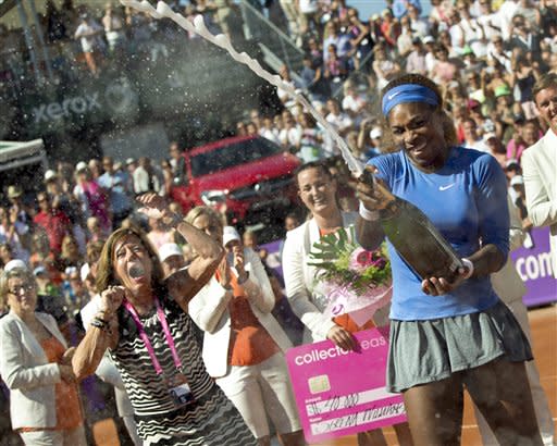 Serena Williams celebrates after winning her 53rd WTA title by beating Johanna Larsson in the final of the Swedish Open on Sunday, July 21, 2013 in Bastad, Sweden. (AP Photo/Bjorn Larsson Rosvall, Scanpix)