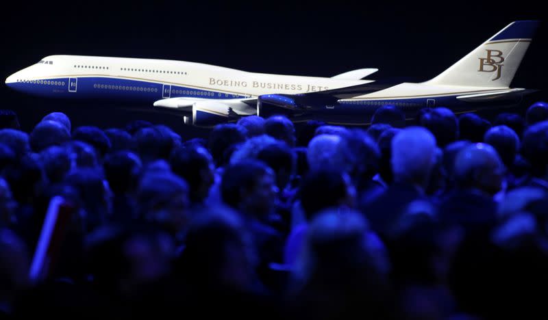 FILE PHOTO: A scale model of a Boeing Business Jet sits displayed as the 747-8 jumbo passenger jet is unveiled to thousands of employees and guests at the Boeing's Everett, Washington commercial airplane manufacturing facility