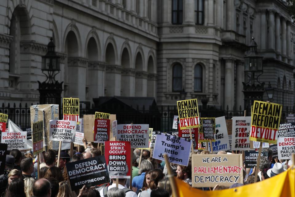 Anti Brexit protesters demonstrate during a rally outside Downing Street in London, Saturday, Aug. 31, 2019. Political opposition to Prime Minister Boris Johnson's move to suspend Parliament is crystalizing, with protests around Britain and a petition to block the move gaining more than 1 million signatures. (AP Photo/Alastair Grant)