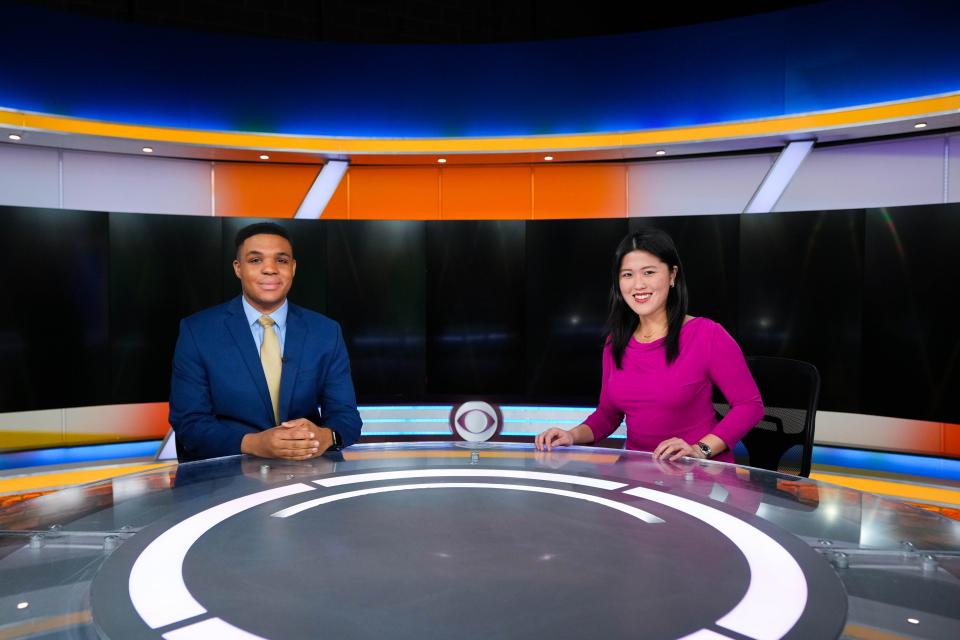 KCCI 8 meteorologist Trey Fulbright and news anchor Nicole Tam pose for a photo after the morning show in one of the studios at KCCI in Des Moines. Tam is KCCI’s first Asian American to host a newscast.