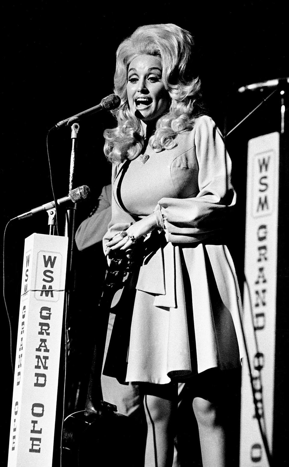 Dolly Parton performs during the Grand Ole Opry show on the stage of the Ryman Auditorium on July 21, 1973.