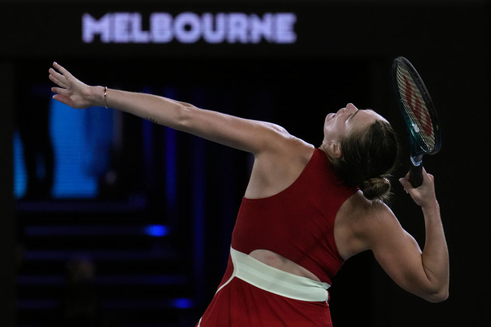 Aryna Sabalenka of Belarus serves to Coco Gauff of the U.S. during their semifinal match at the Australian Open tennis championships at Melbourne Park, Melbourne, Australia, Thursday, Jan. 25, 2024. (AP Photo/Andy Wong)