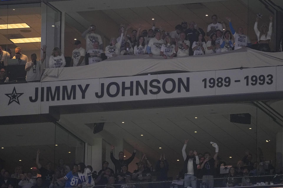 Pro Football Hall of Fame coach Jimmy Johnson's name is unveiled as he is inducted into the Dallas Cowboys ring of honor during a ceremony at halftime of an NFL football game between the Cowboys and the Detroit Lions, Saturday, Dec. 30, 2023, in Arlington, Texas. (AP Photo/Sam Hodde)