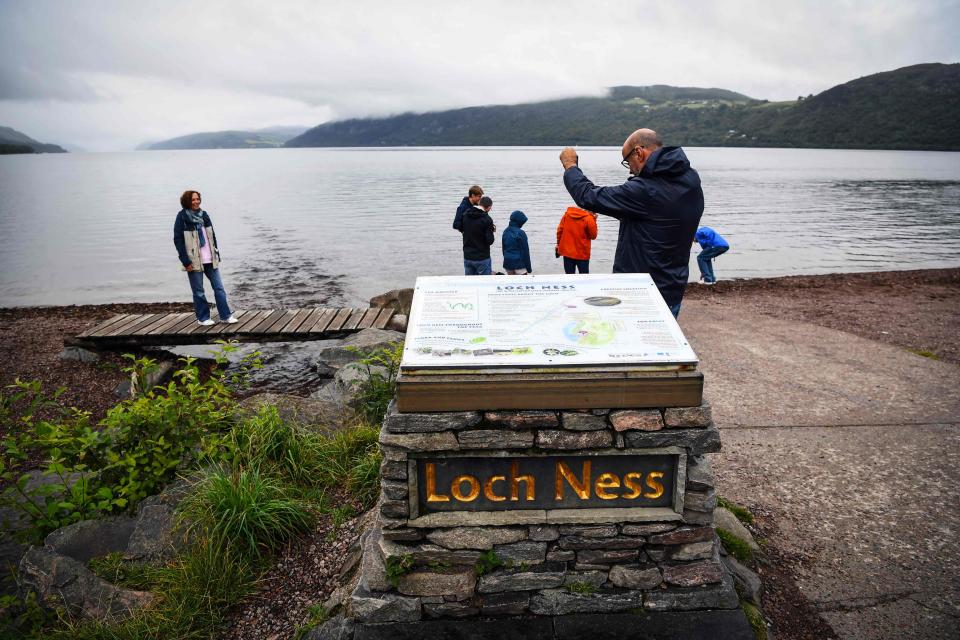 People visit Dores Beach on Loch Ness in Scotland on Aug. 27, 2023.
