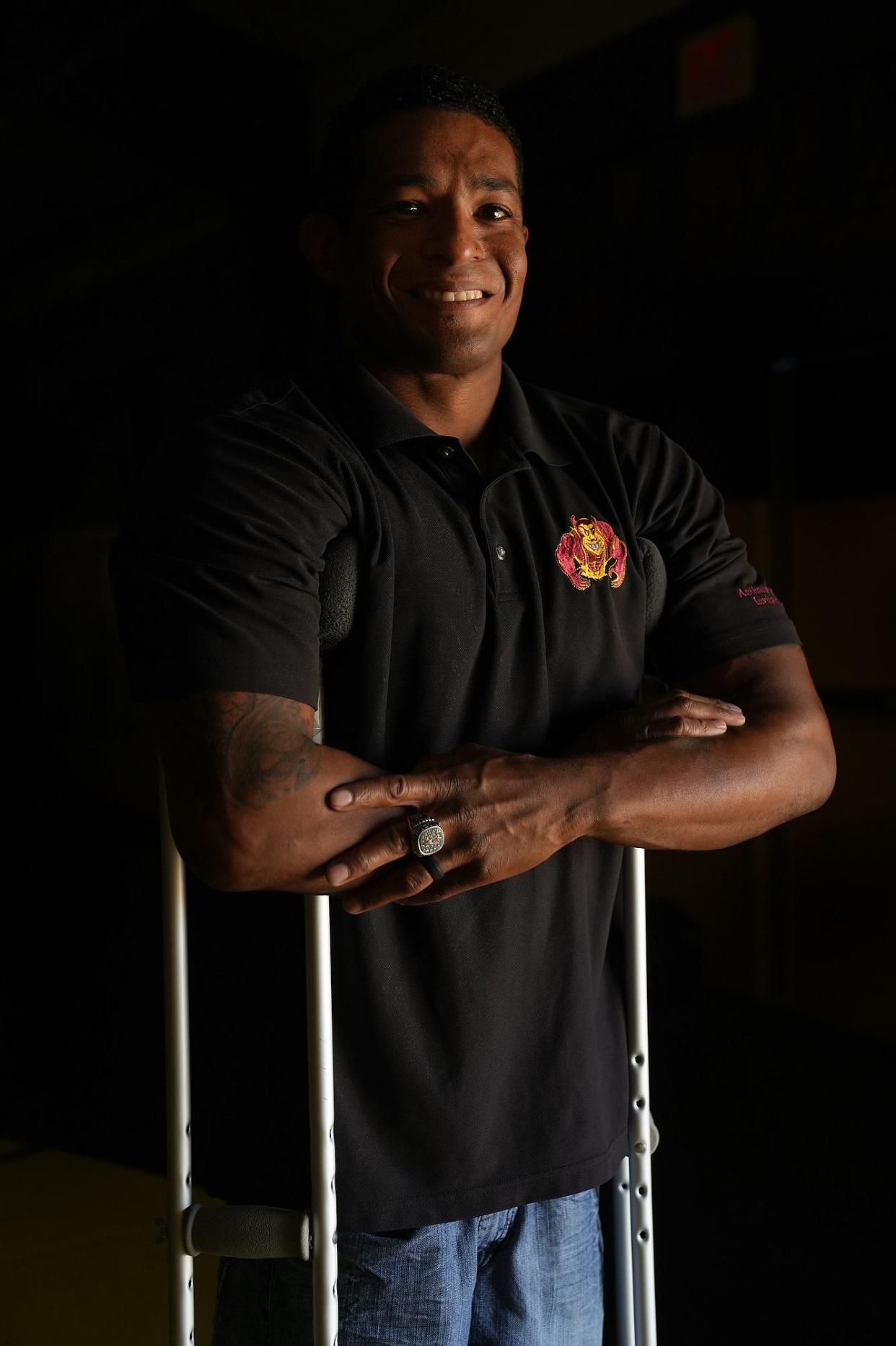 Anthony Robles, former ASU NCAA individual wrestling champion, poses for a portrait at the Riches Wrestling Complex on Thursday, Oct. 6, 2022, in Tempe. Robles will be inducted into the ASU Sports Hall of Fame.