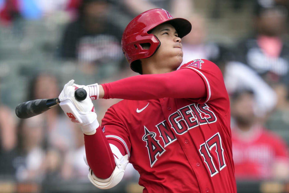 FILE - Los Angeles Angels' Shohei Ohtani watches his second, two-run home run of the game off Chicago White Sox starting pitcher Lance Lynn during the fourth inning of a baseball game Wednesday, May 31, 2023, in Chicago. Shohei Ohtani has been named The Associated Press' Male Athlete of the Year for the second time in three years. (AP Photo/Charles Rex Arbogast, File)