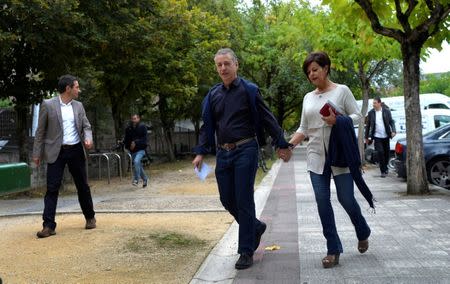 Basque premier Inigo Urkullu (C) and his wife Lucia Arieta arrive to vote in Basque regional elections in Durango, northern Spain, September 25, 2016. REUTERS/Vincent West