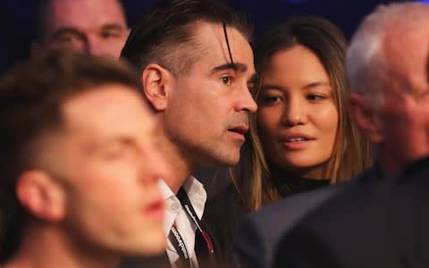 Colin Farrell looks on from ringsideat  - Credit: Getty