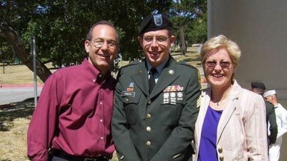 Sgt. Daniel Somers with his parents, Howard and Jean