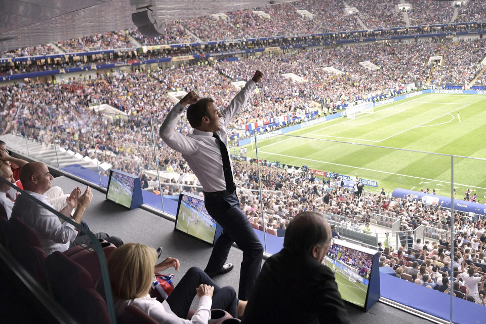 FILE - French President Emmanuel Macron cheers during the final match between France and Croatia at the 2018 soccer World Cup in the Luzhniki Stadium in Moscow, Russia on July 15, 2018. (Alexei Nikolsky/Sputnik/Kremlin Pool Photo via AP, File)