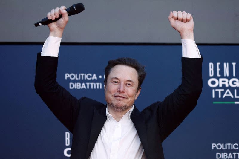 FILE PHOTO: Elon Musk attends Italy's PM Meloni's right-wing party's political festival Atreju, in Rome