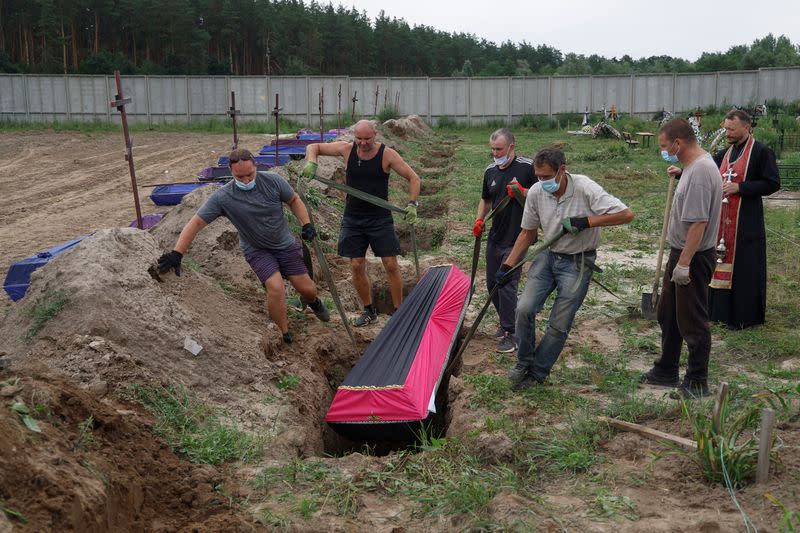 Mass burial of unidentified people killed during Russian invasion in Bucha