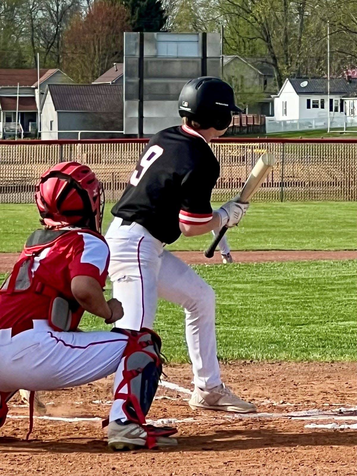 Cardington's Wyatt Wade looks to lay down a bunt during a baseball game at Centerburg last week.