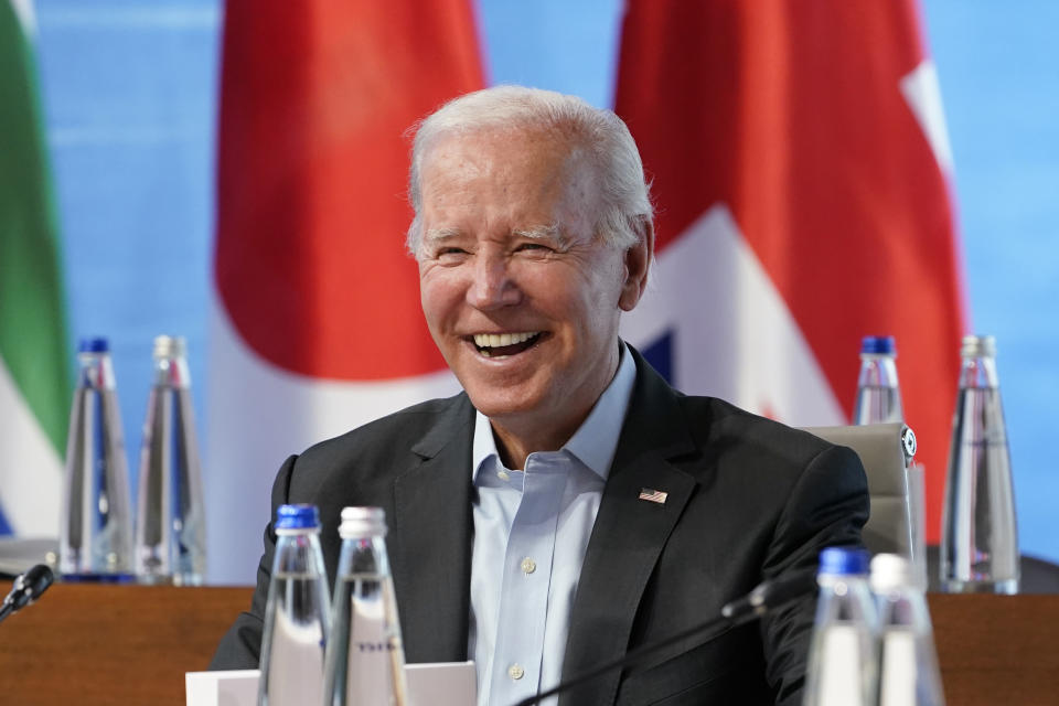 President Joe Biden smiles as he waits for the start of a lunch with the Group of Seven leaders at the Schloss Elmau hotel in Elmau, Germany, Monday, June 27, 2022, during the annual G7 summit. Joining the Group of Seven are guest country leaders and heads of international organizations. (AP Photo/Susan Walsh, Pool)