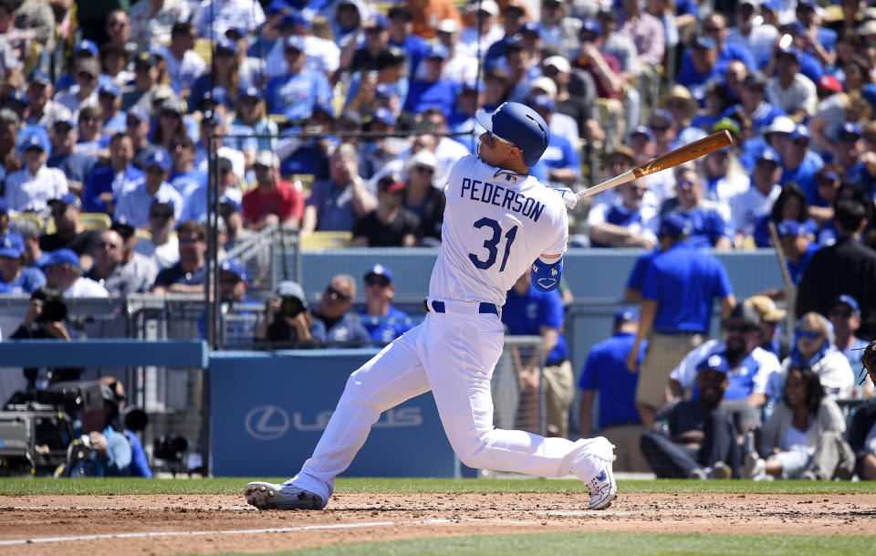 Los Angeles Dodgers' Joc Pederson hits a two-run home run during the second inning of a baseball game against the Arizona Diamondbacks, Thursday, March 28, 2019, in Los Angeles. (AP Photo/Mark J. Terrill)