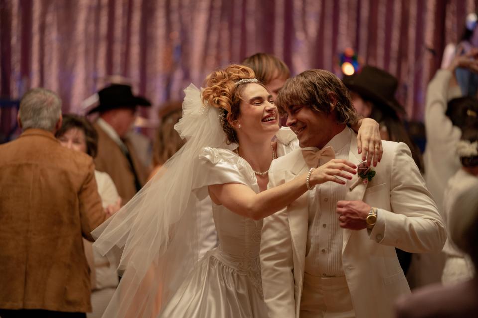 Kevin Von Erich (Zac Efron) shares a dance with new wife Pam (Lily James) at their wedding in the true-life family wrestling drama "The Iron Claw."