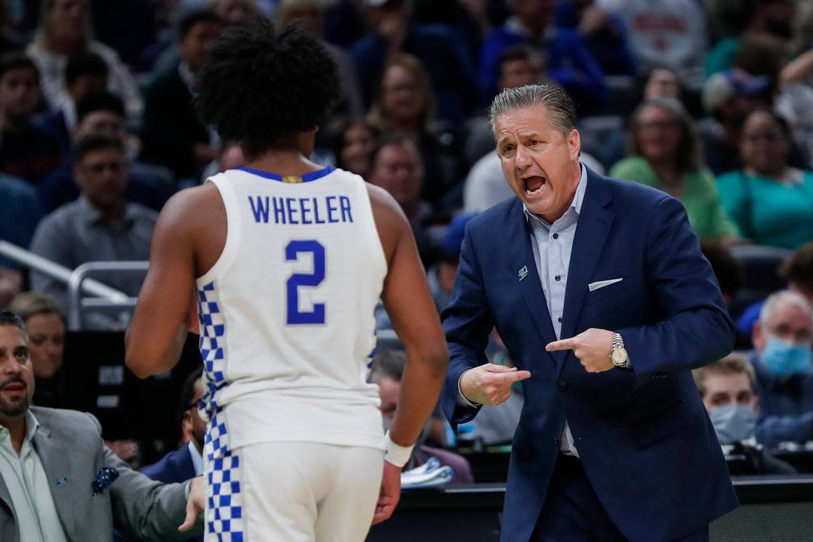 Kentucky Coach John Calipari reacts after a turnover by point guard Sahvir Wheeler against Saint Peter’s in the NCAA Tournament last season. Wheeler, now a senior, was an improved player in his first year at Kentucky after transferring from Georgia, but there’s more work to do in 2022-23, starting this week in the Bahamas.