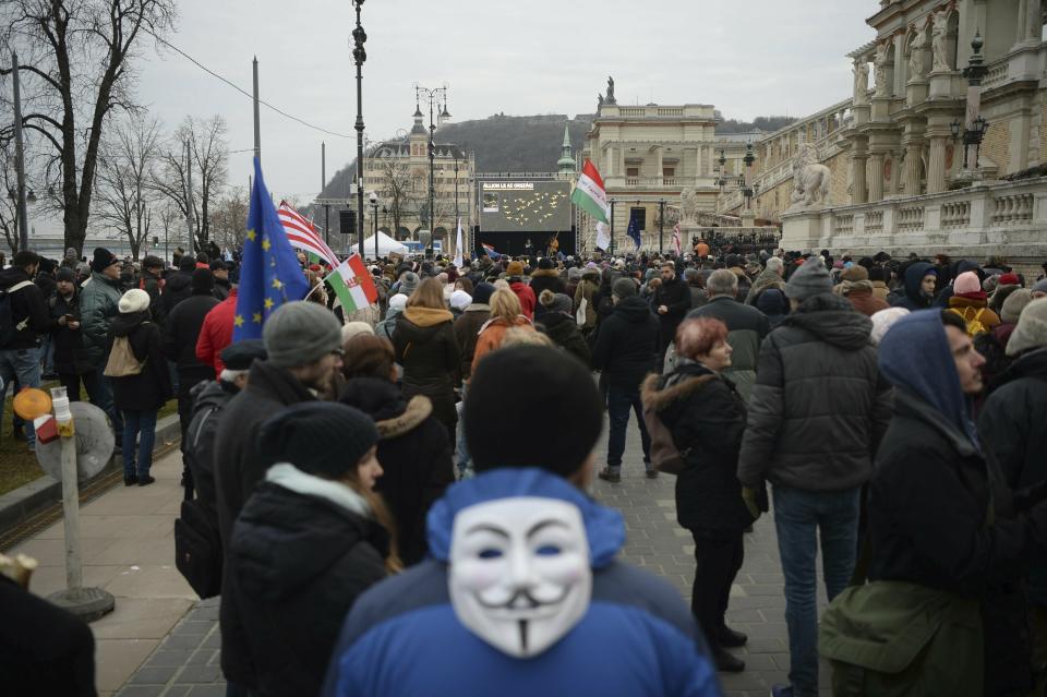 Demonstrators gather during a protest against the recent amendments to the labour code, dubbed 'slave law' by opposition forces, in downtown Budapest, Hungary, Saturday, Jan. 19, 2019. (Zoltan Balogh/MTI via AP)