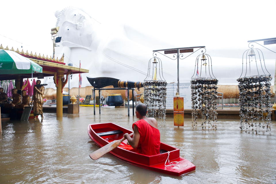 A lying Buddha statue is seen during the flood at a Temple in Ayutthaya, Thailand, October 6, 2021. REUTERS/Soe Zeya Tun