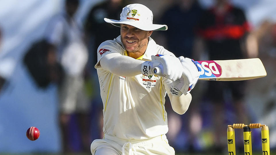 David Warner hasn't played in the BBL since 2013, with Cricket Australia desperate to get the Test opener back into the competition. (Photo by ISHARA S. KODIKARA/AFP via Getty Images)