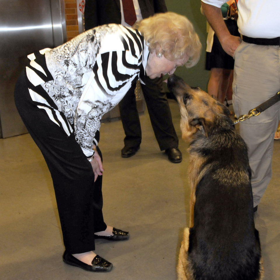 23 Pictures Of Betty White With Puppies To Brighten Your Day