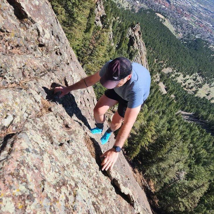 climber on Boulder's Flatirons in Arc'Teryx SL 3