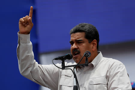 FILE PHOTO: Venezuela's President Nicolas Maduro delivers a speech to supporters during a campaign rally in Charallave, Venezuela May 15, 2018. REUTERS/Carlos Garcia Rawlins/File Photo