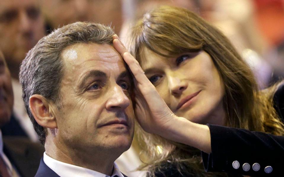 Carla Bruni and her husband Nicolas Sarkozy, who feared Jagger's influence on his wife - AP Photo/Claude Paris