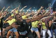 <p>Usain Bolt celebrates after winning the Mens 150 Metre Race during the Melbourne Nitro Athletics Series at Lakeside Stadium </p>