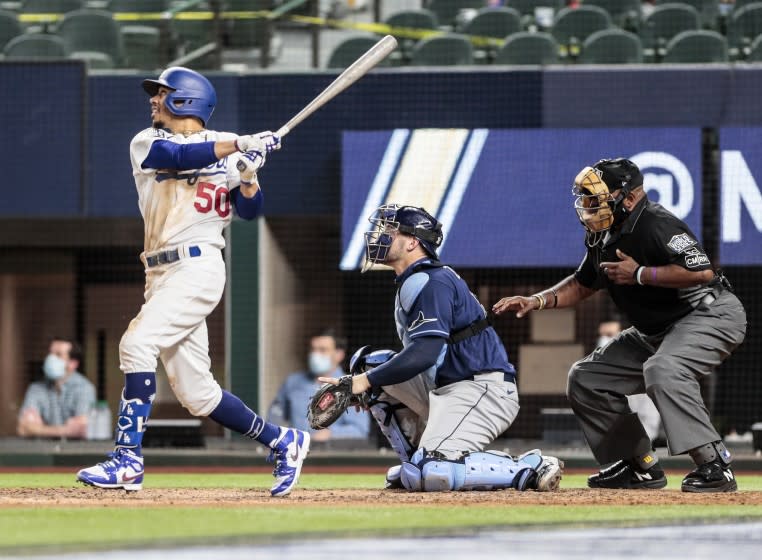 Arlington, Texas, Tuesday, October 20, 2020 Los Angeles Dodgers right fielder Mookie Betts (50) homers against Tampa Bay Rays starting pitcher Tyler Glasnow (20) in the sixth inning in game one of the World Series at Globe Life Field. (Robert Gauthier/ Los Angeles Times)