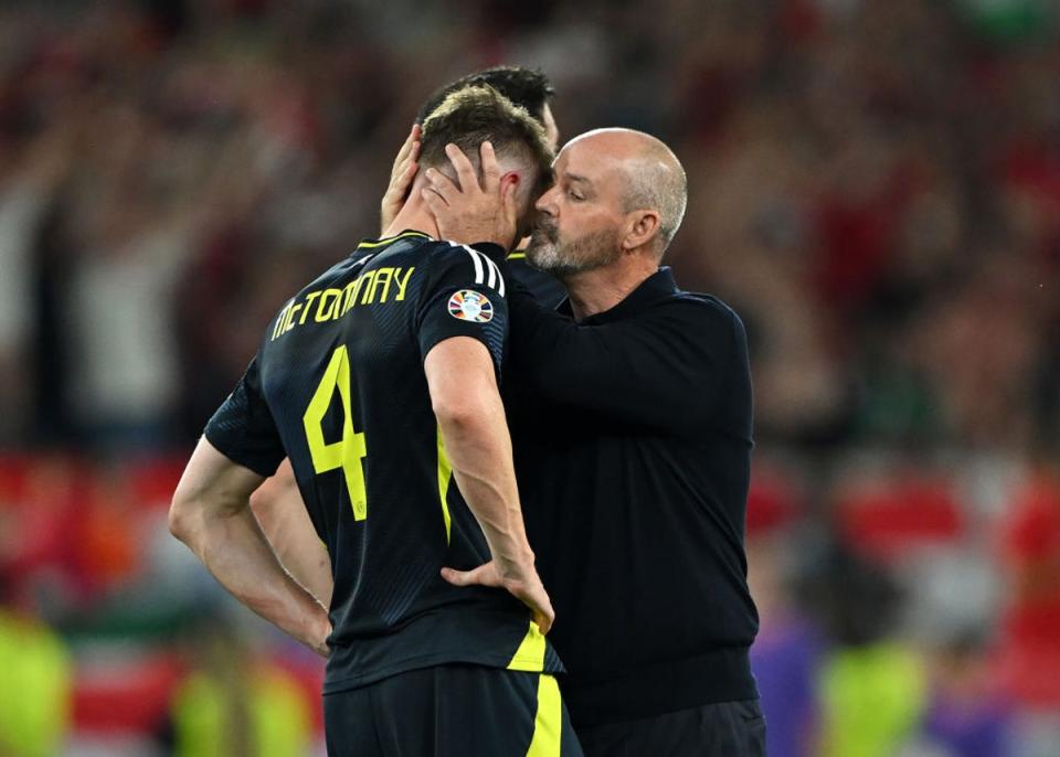 Clarke consoles Scott McTominay after defeat to Hungary (Getty)