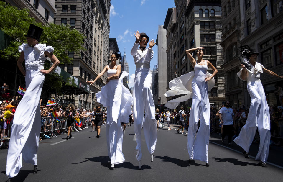 A group representing POSE participates in the LBGTQ Pride march Sunday, June 30, 2019, in New York. New York's Pride March. (AP Photo/Craig Ruttle)