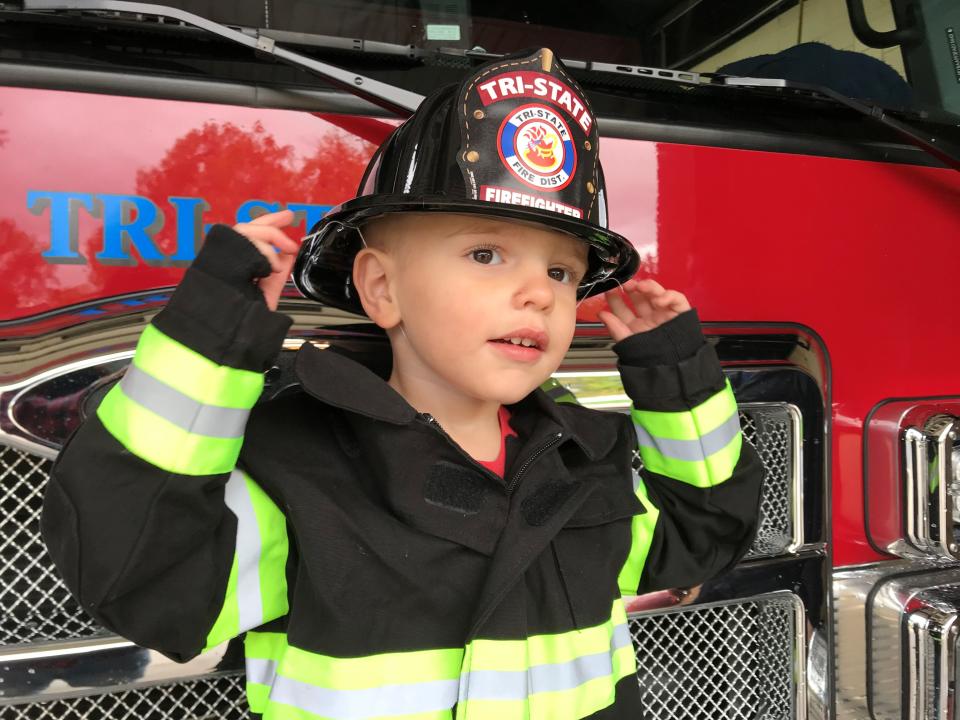 IndyStar columnist James Briggs' son, Felix, tours the Tri-State Fire Protection District, where his great-grandfather, George Laws, worked as a volunteer firefighter.