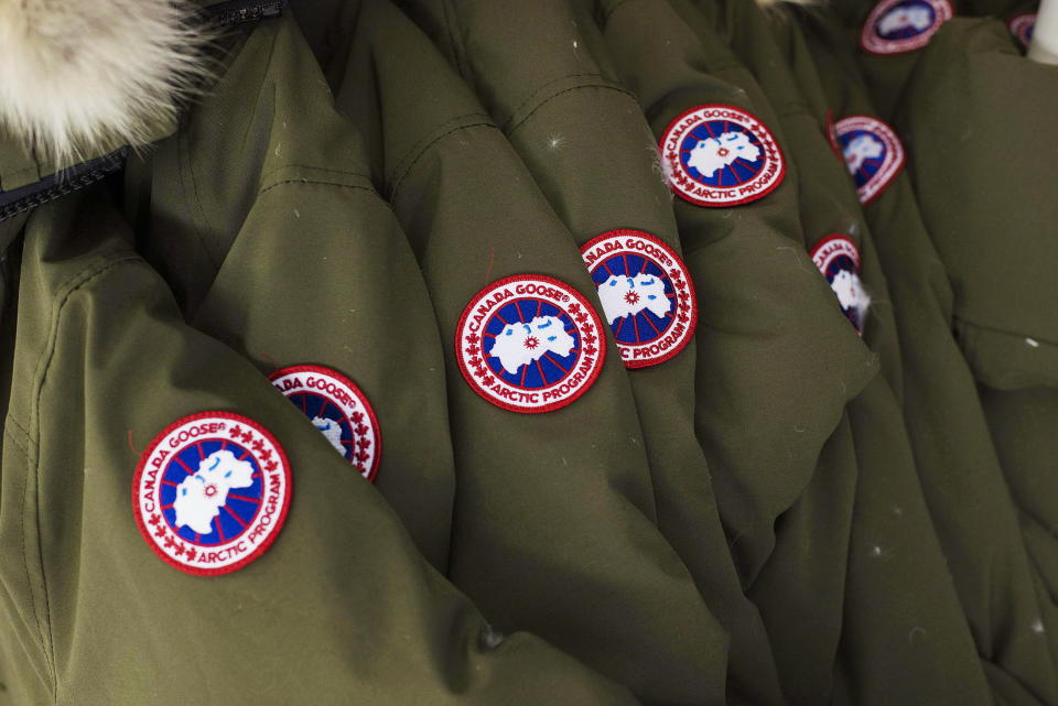 Jackets hang at the factory of Canada Goose Inc. in Toronto on Thursday, November 28, 2013. Canada Goose is trying to 