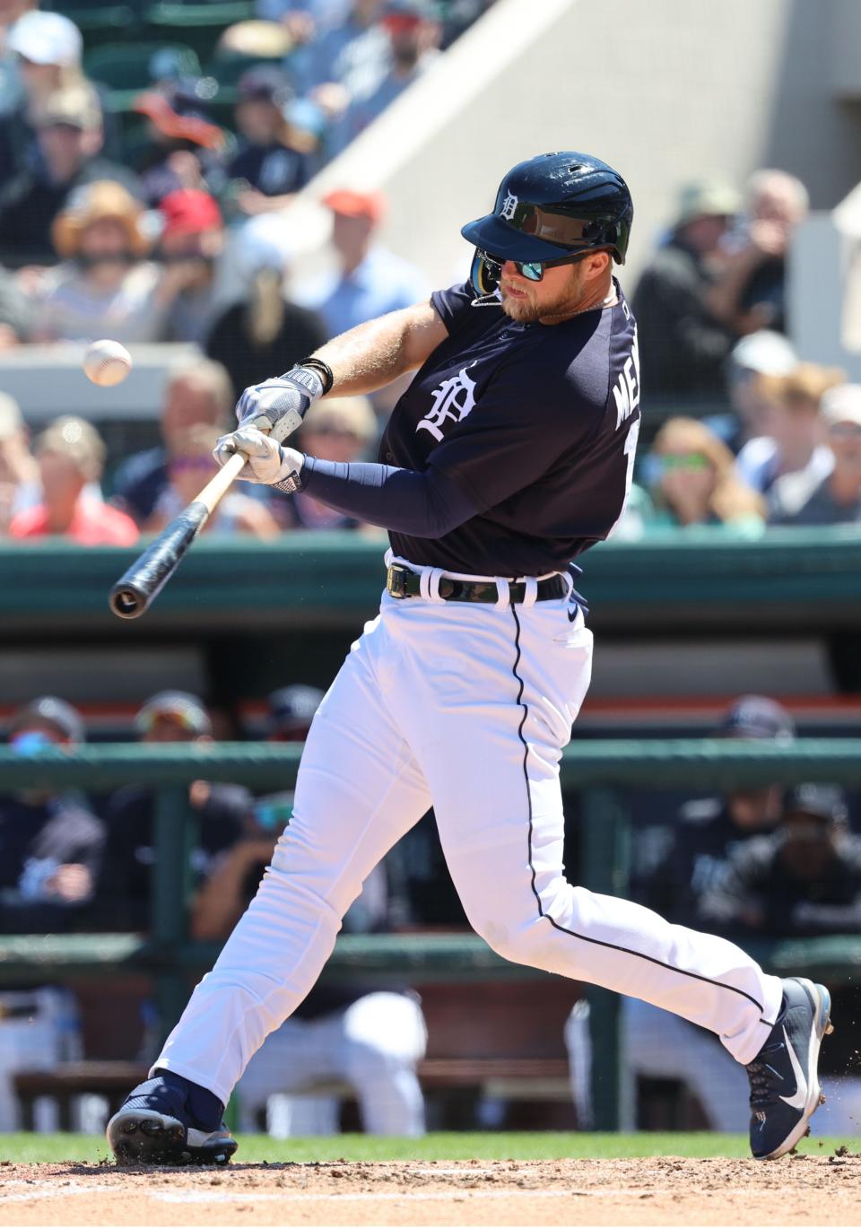 Mar 20, 2023; Lakeland, Florida, USA; Detroit Tigers outfielder Austin Meadows (17) doubles against the Toronto Blue Jays during the fifth inning at Publix Field at Joker Marchant Stadium.