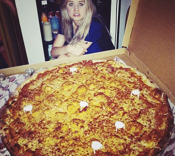 Singer and Disney actress Debby Ryan looked terrified of the giant cheese pizza that she faced in this pic. Let’s hope she just took it one bite at a time… (Photo: Instagram)