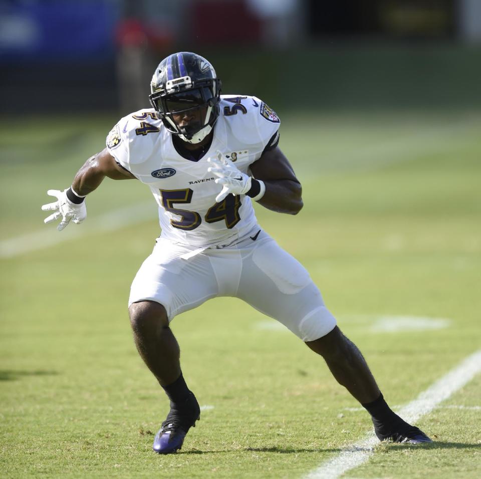 FILE - In this Aug. 4, 2016, file photo, Baltimore Ravens linebacker Zachary Orr awaits a pass during NFL football training camp in Owings Mills, Md. Orr has announced his retirement, Friday, Jan. 20, 2017, after learning he has a congenital spinal condition. (AP Photo/Gail Burton, File)