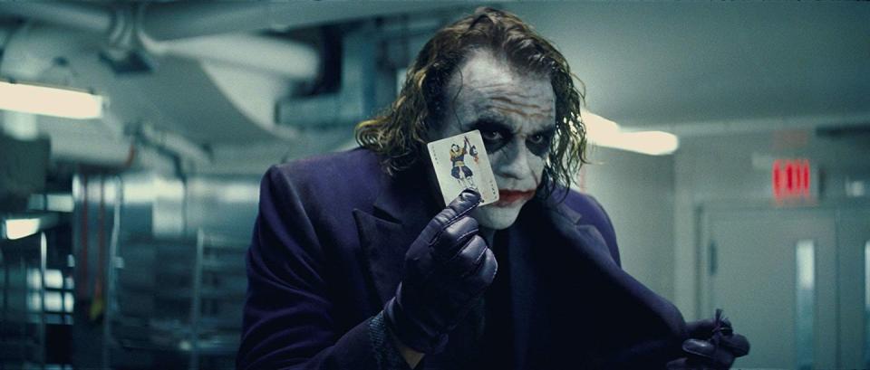 <p>Many <em>Batman</em> fans have speculated about the Joker's origin story, but no theory has been as compelling as <a href="https://screenrant.com/dark-knight-heath-ledger-joker-origin-theory/2/" rel="nofollow noopener" target="_blank" data-ylk="slk:the one;elm:context_link;itc:0;sec:content-canvas" class="link ">the one</a> that suggests that the villain was a former soldier in the Iraq War who is suffering from PTSD. This not only explains his facial scarring and his extensive knowledge of explosives and firearms, but also suggests a deeper insight into his madness and tortured psyche. </p><p>In <a href="https://www.youtube.com/watch?v=91TbwAmsIfU" rel="nofollow noopener" target="_blank" data-ylk="slk:one scene;elm:context_link;itc:0;sec:content-canvas" class="link ">one scene</a>, for example, the Joker mentions rather bitterly in one scene that no one would "bat an eye" if "a truckload of soldiers" got blown up. Could it be that his disgust stems from his status as a disgruntled and mentally unbalanced war veteran?</p>