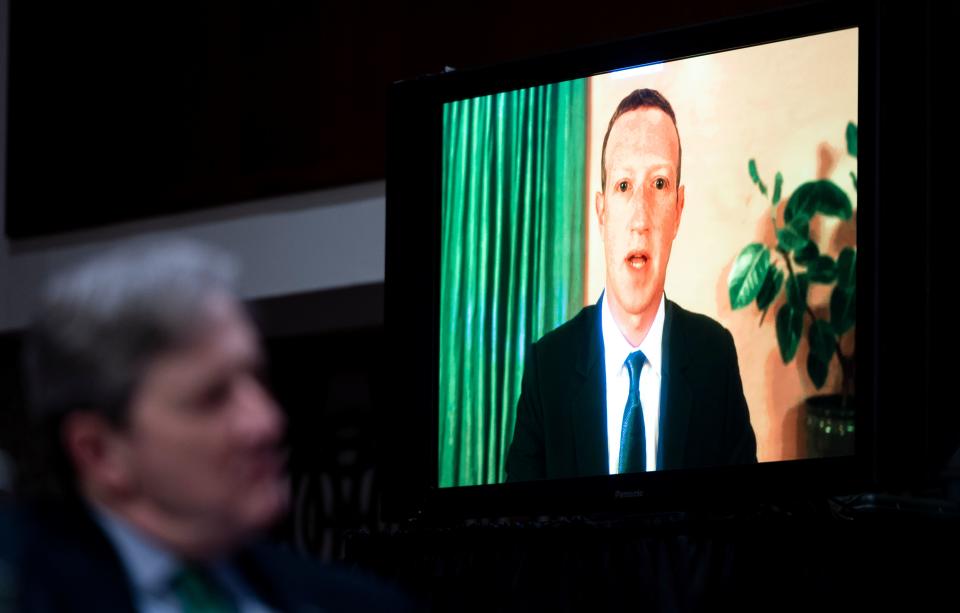 Mark Zuckerberg, Chief Executive Officer of Facebook, testifies remotely as Senator John Kennedy (R-LA) looks on during the Senate Judiciary Committee hearing on 'Breaking the News: Censorship, Suppression, and the 2020 Election' on Capitol Hill on November 17, 2020 in Washington, DC. (Photo by Bill Clark / POOL / AFP) (Photo by BILL CLARK/POOL/AFP via Getty Images)