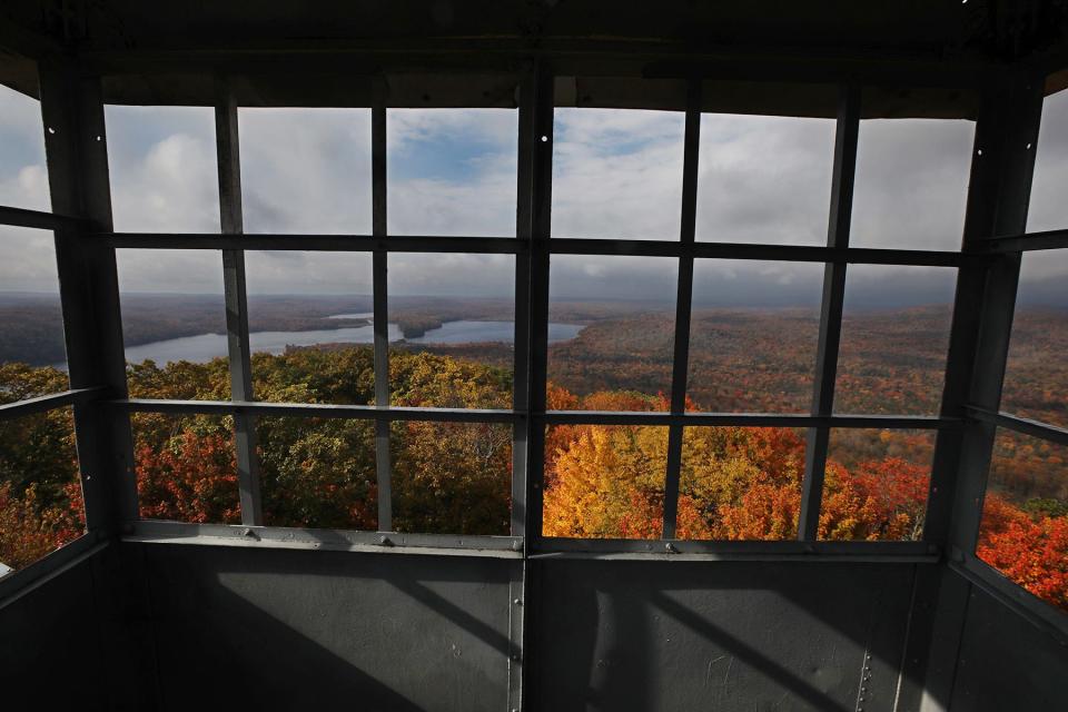 View of the changing fall colors from atop the Kane Mountain fire tower near Caroga Lake in the Adirondacks.